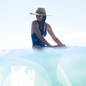 surfer girl with hat lore of the sea navy one piece