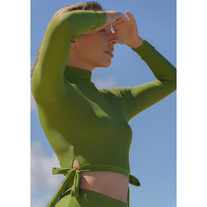 Woman wearing a green crop top