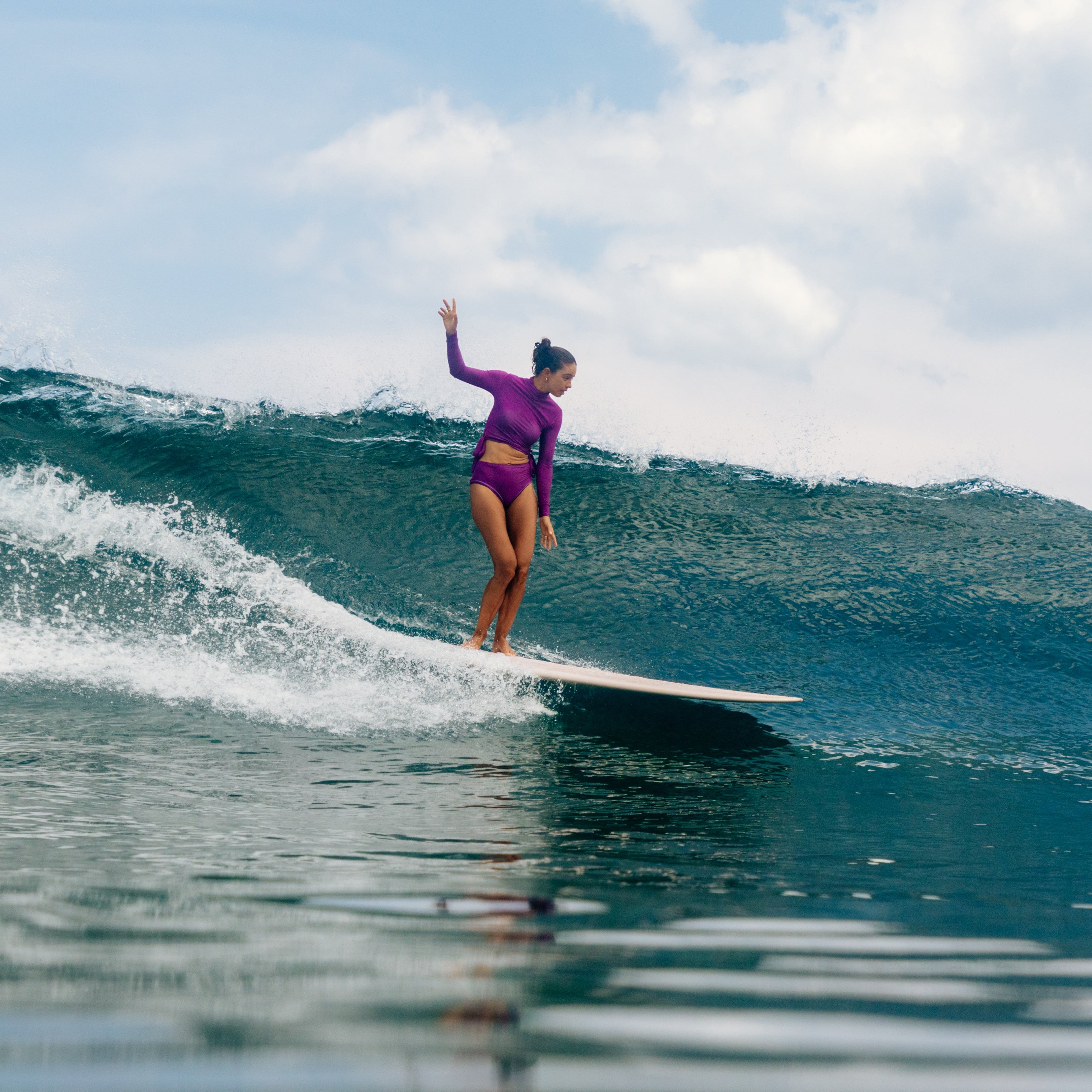 Surfer girl in Surfwear for women lore of the sea
