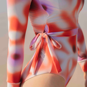 Close-up of a colorful swimsuit with a tie detail 