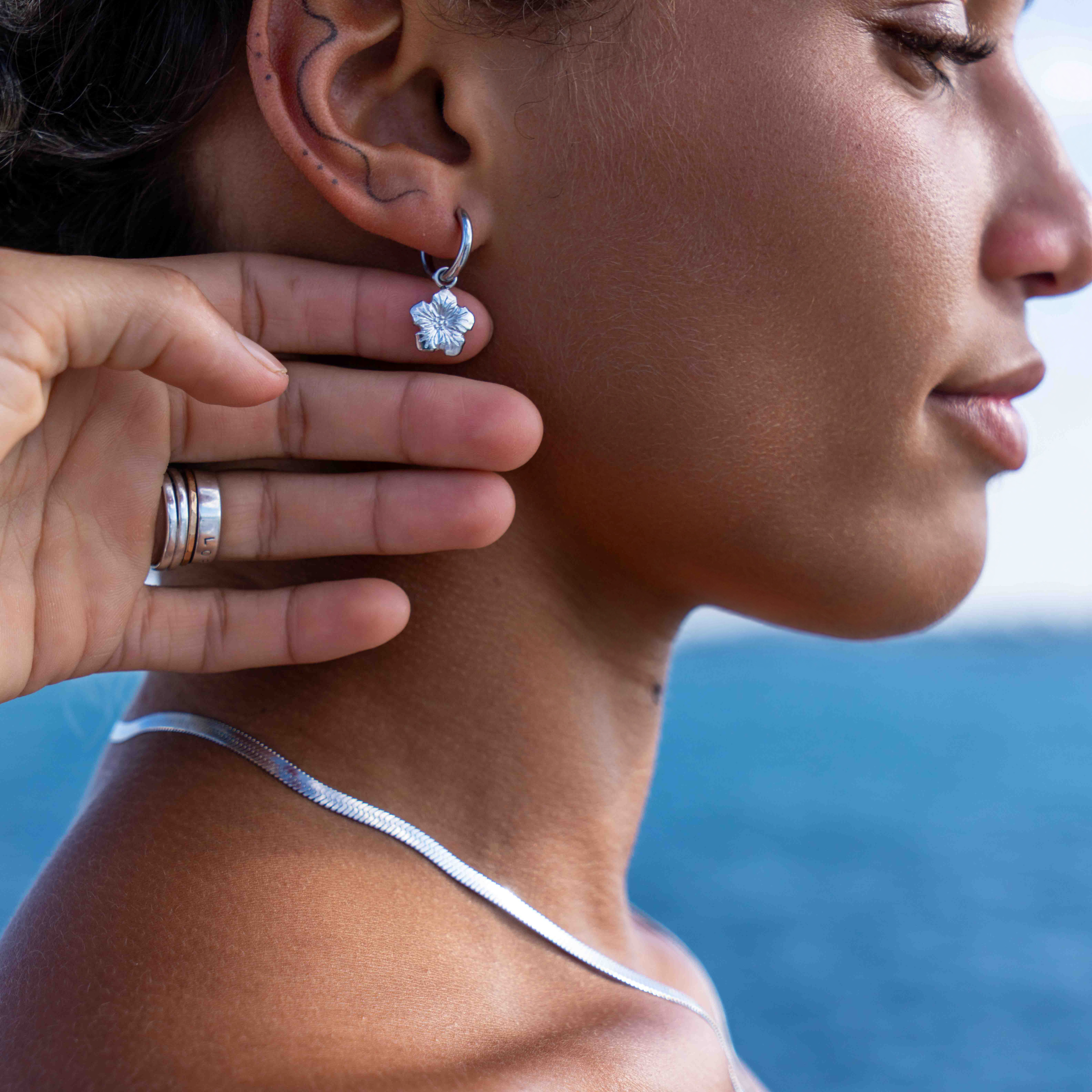 silver surf waterproof earrings and necklace by lore of the sea