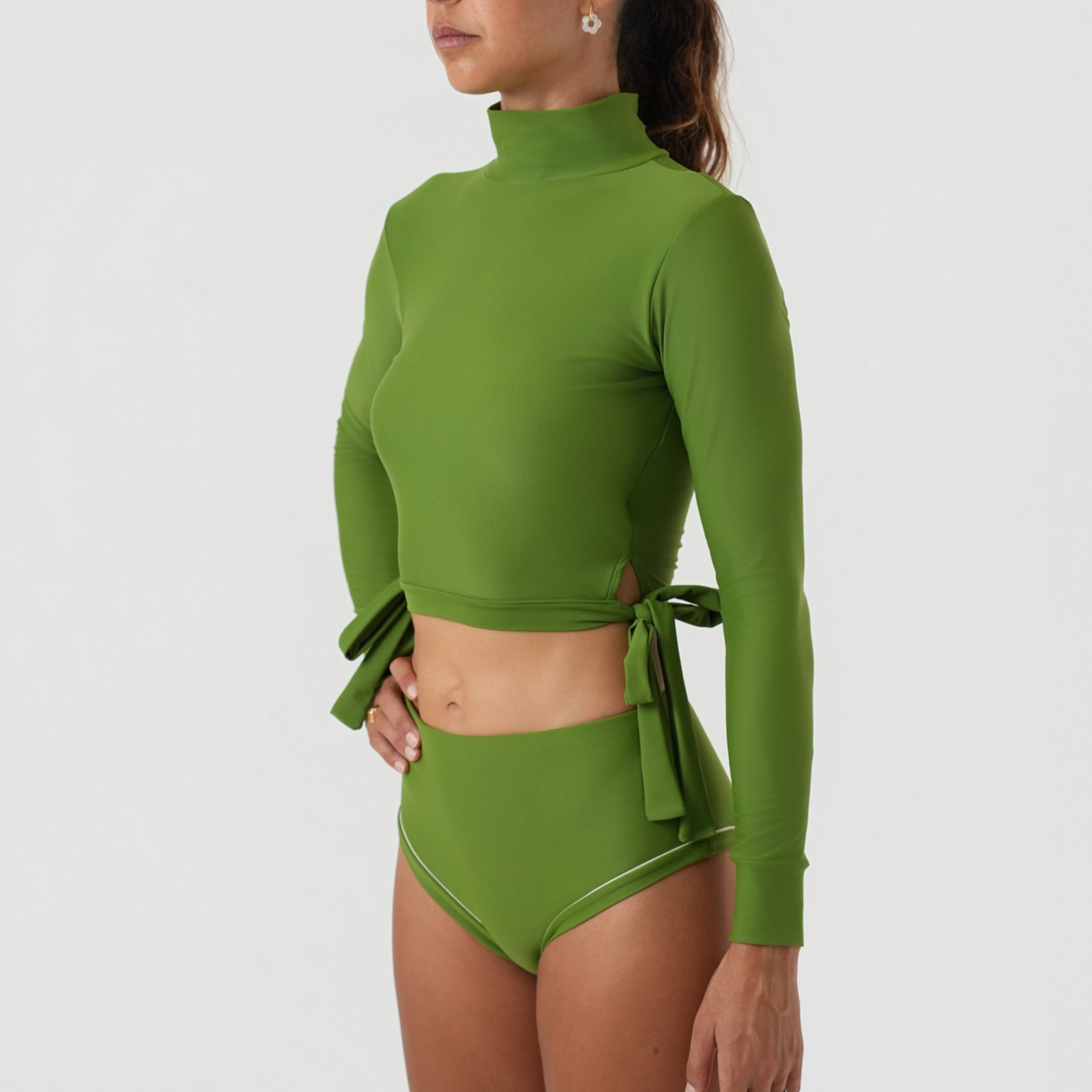 Green long-sleeve rash top and high-waisted bottoms