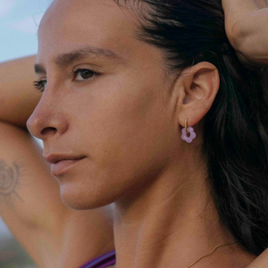 flower-shape earrings, gold hoops
