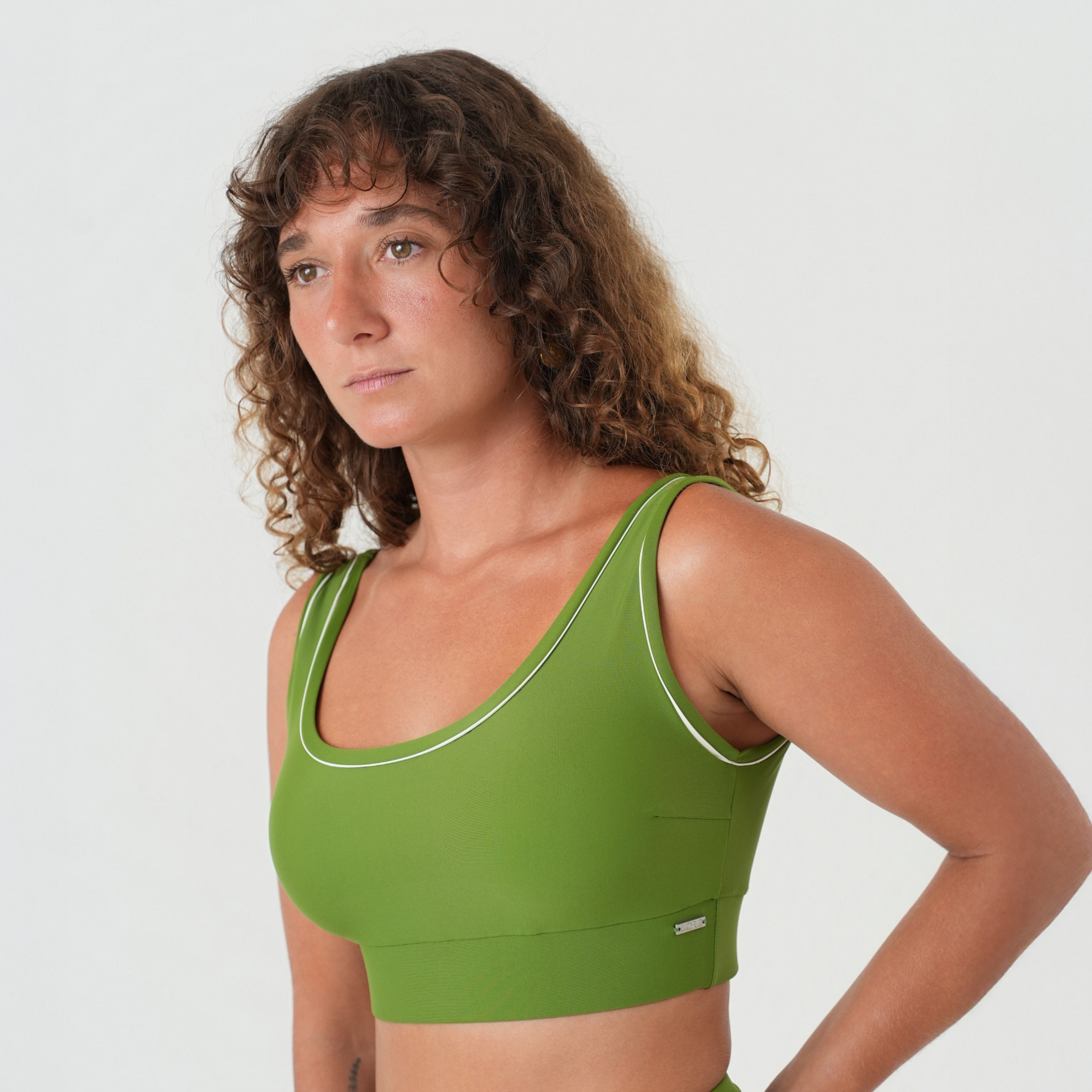 woman wearing green bikini top