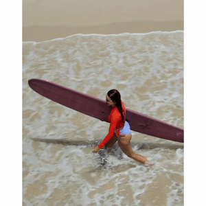 Mademoiselle of the sea wearing the ACOTZ CROPPED TOP PAPAYA