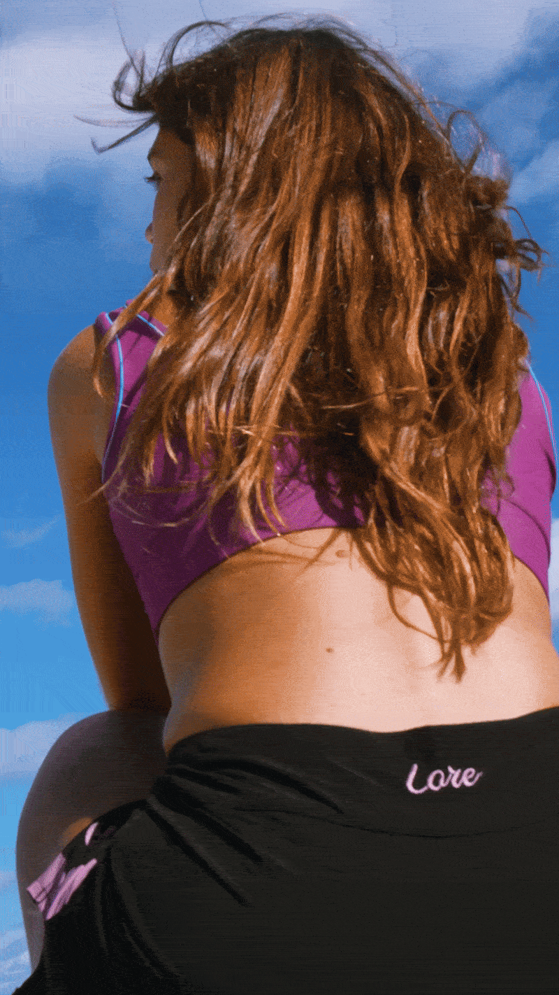 surfer wearing boardies