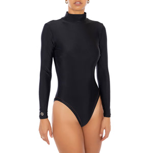 girl wearing the ALAIA black one piece surfsuit 