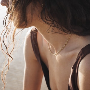 Lore of the sea gold waterproof surf necklace