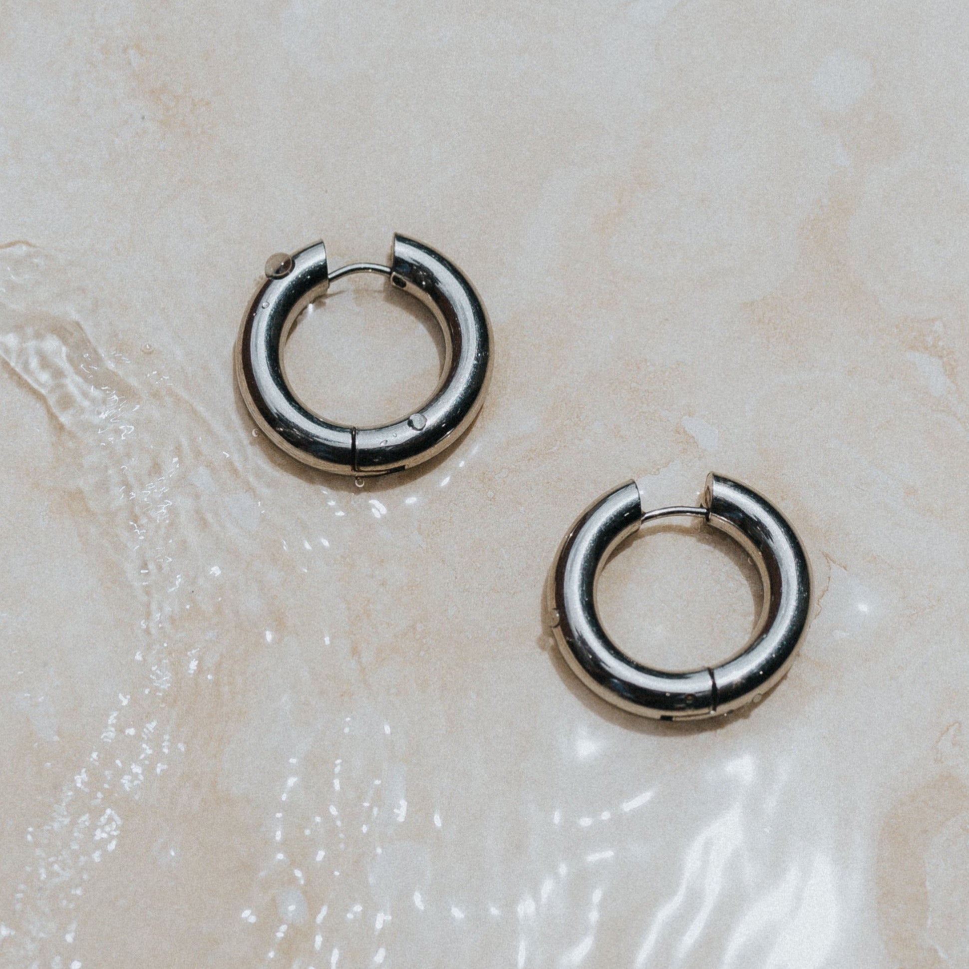 Stainless steel surf proof earrings by Lore of the Sea silver hoops