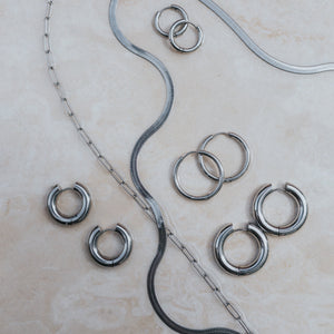 Silver waterproof jewellery for surfing by Lore of the Sea