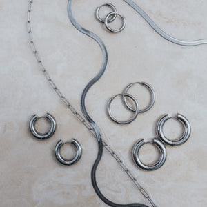 Silver waterproof jewellery for surfing by Lore of the Sea