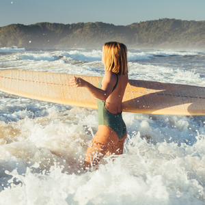Green swimsuit for surfing Lore of the Sea